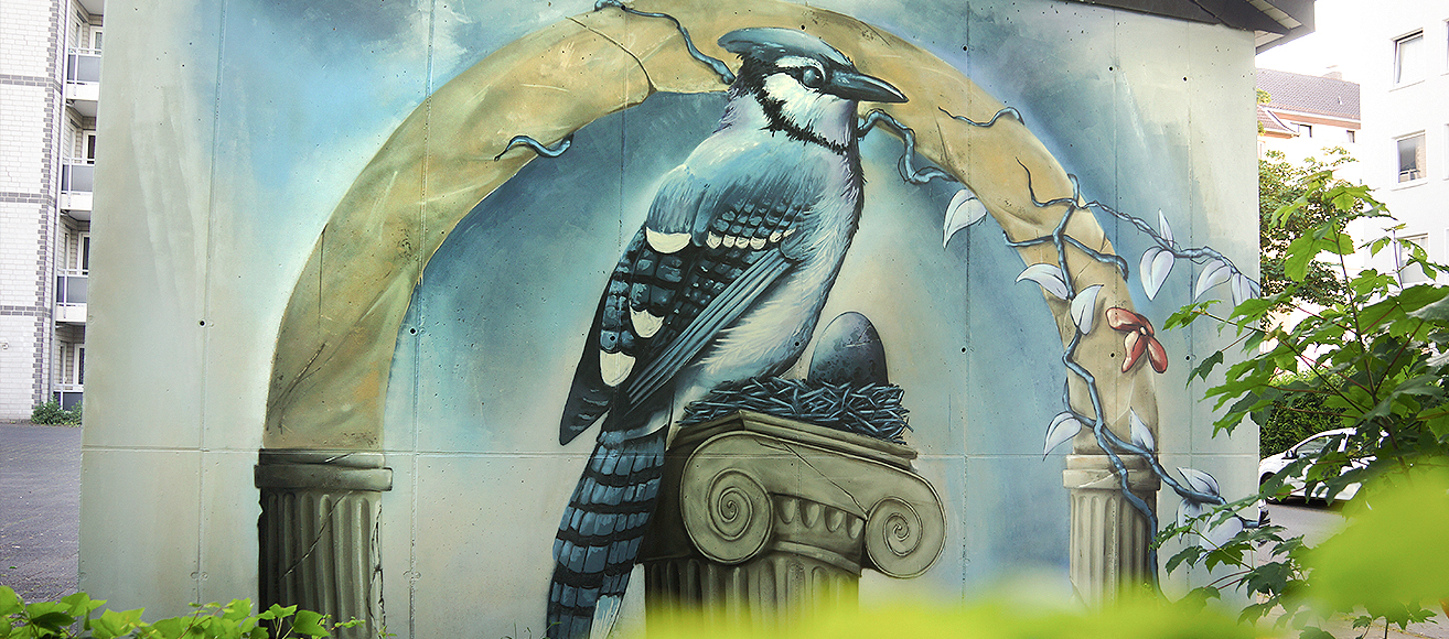 Vogel im Nest auf einer Säule Graffiti in der Albrechtstraße in Bielefeld